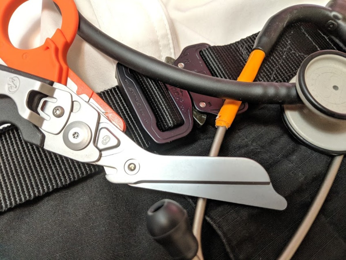 EMT belt with Leatherman raptor shears and stethoscope.  