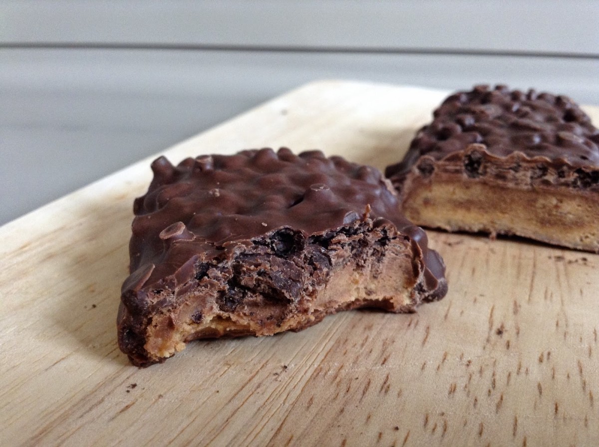 Cross-section of a chocolate peanut butter cup Combat Crunch bar.