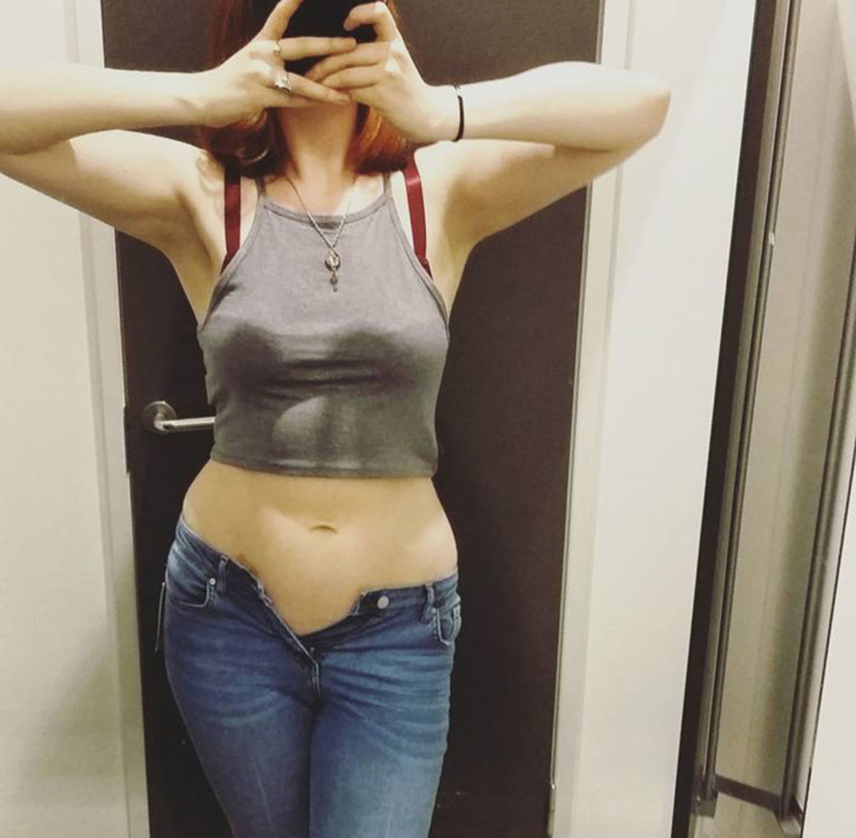 Ruth posted this photo of herself trying to put on size 16 jeans.