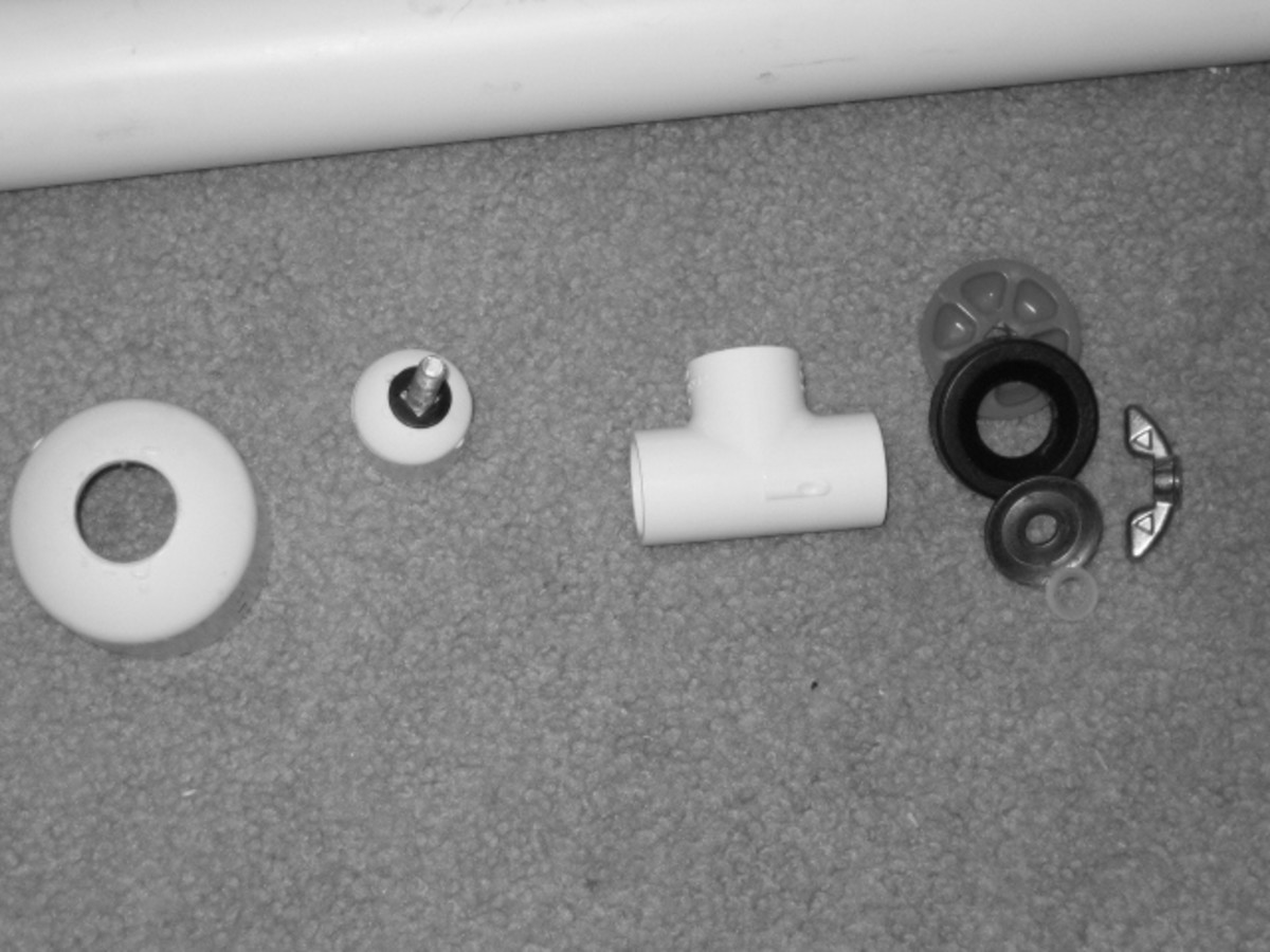 Caps drilled, "T" Connector, and Test Plug disassembled