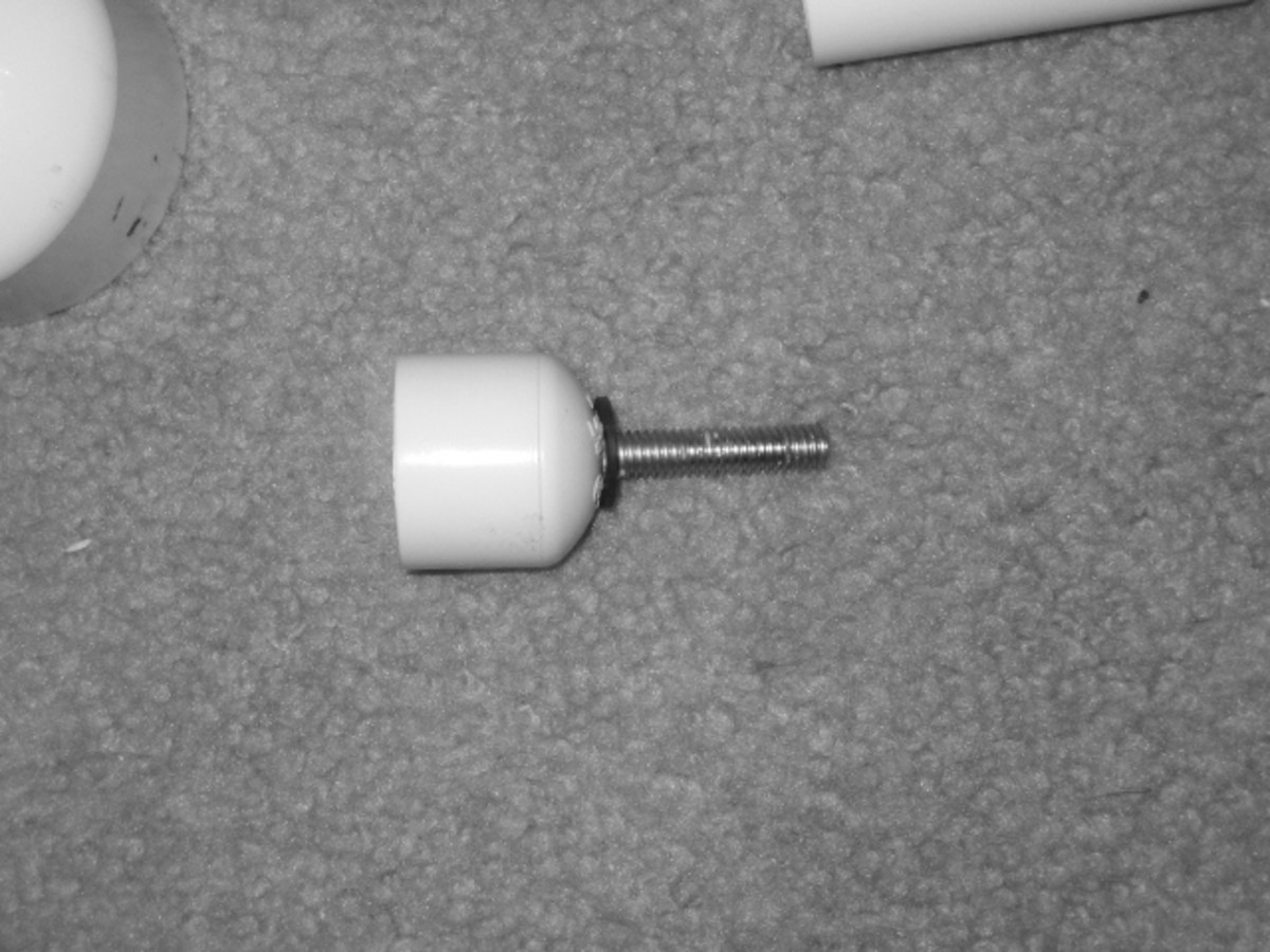 Screw from the Test Plug inserted in the 3/4" Cap and epoxied in place.