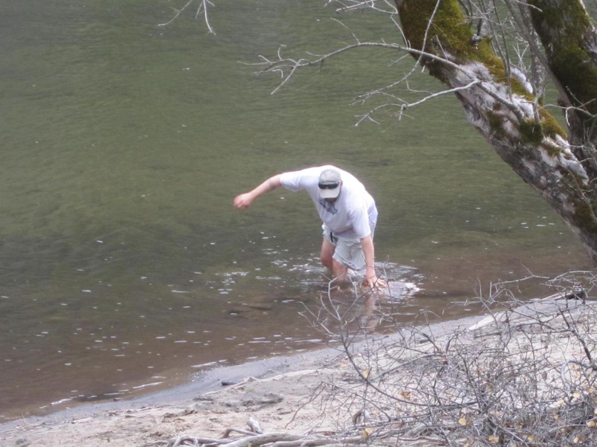 Jeremy takes a dip in the Merced River by our campsite. There's a sandy "beach" at the nearby day-use area.
