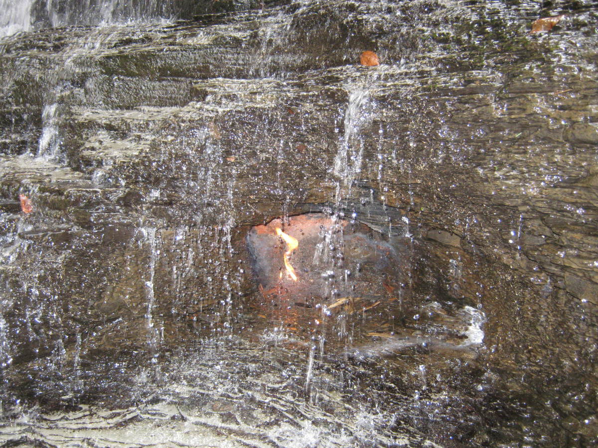 The Eternal Flame behind the waterfall.  