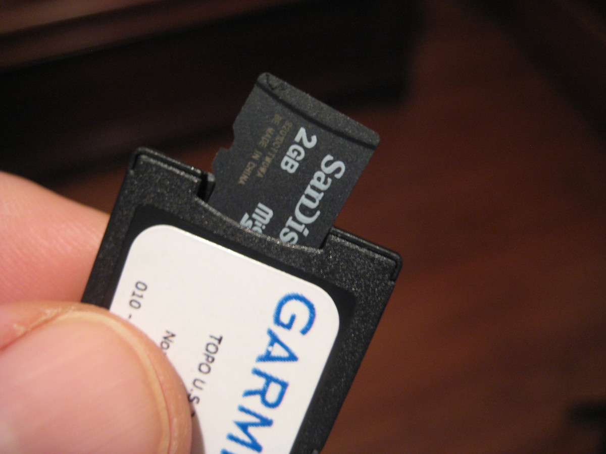 Remove the micro SD card from the SD card adapter.  