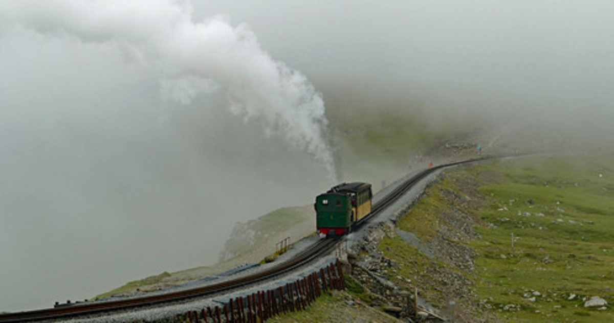 The Snowdon train chugs its way up to the peak on a typically bright, summer day.