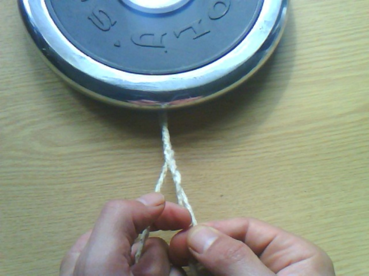 Plait the three mop strands together