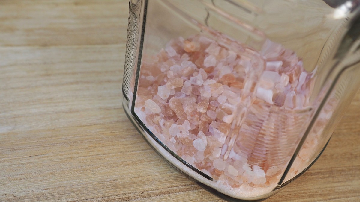 Start by filling a Mason jar 1/4 full with Himalayan sea salt crystals.