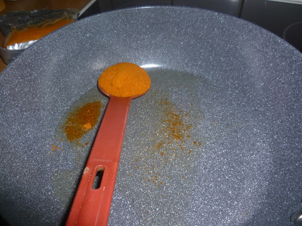 Add 2 Tablespoons Rapeseed Oil to pan and a Tablespoon of Curry Powder