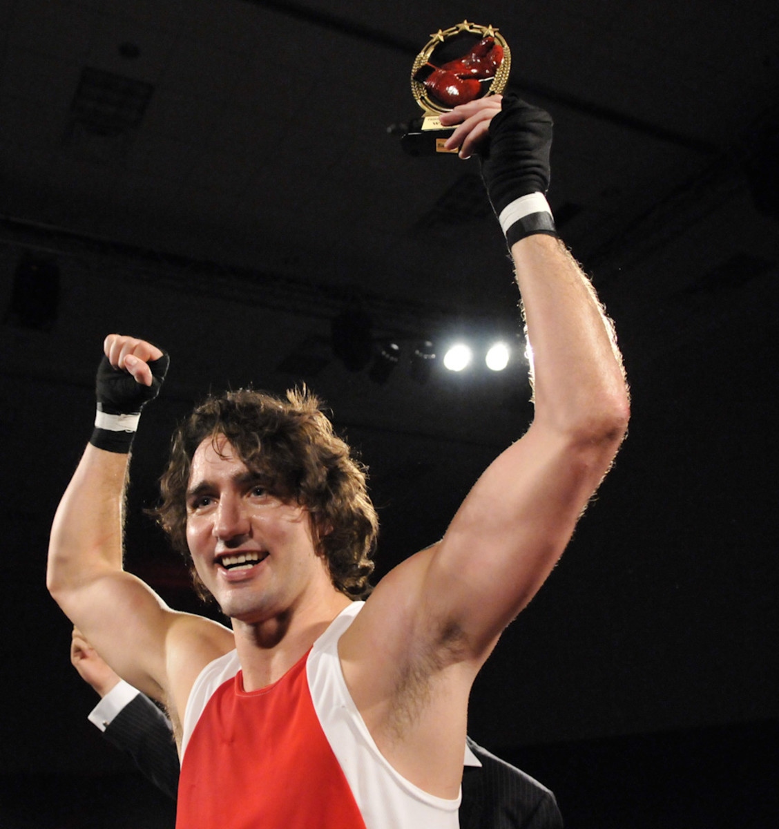 Liberal MP Justin Trudeau celebrates after he defeated Conservative Senator Patrick Brazeau during charity boxing match for cancer research in Ottawa (Mar 31, 2012).