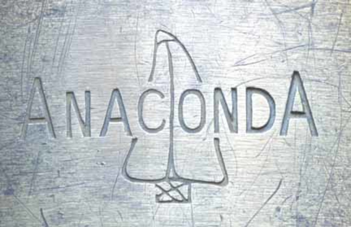 Logo of the Anaconda Copper Company.