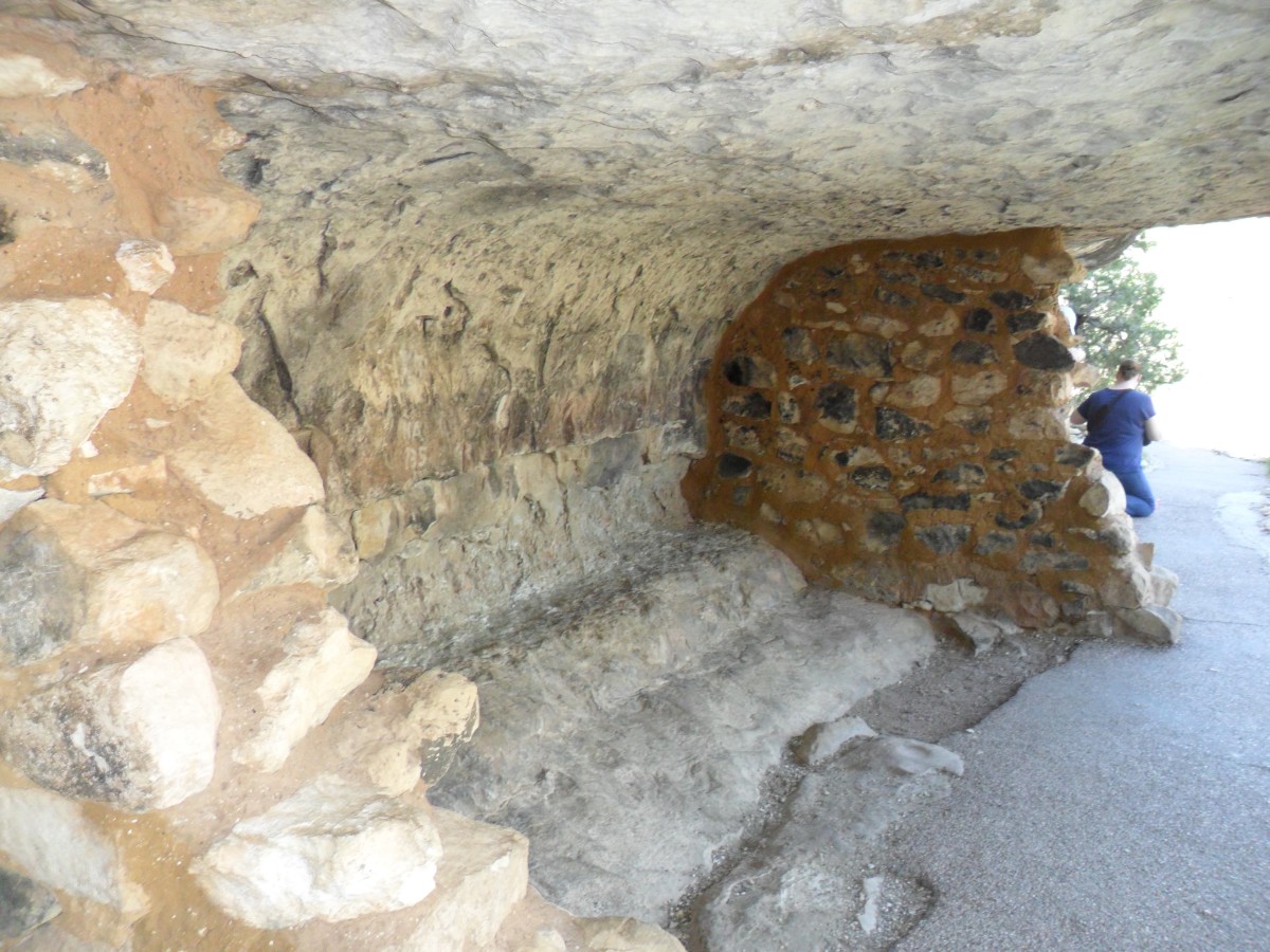 Natural floor, ceiling, and back wall of a cliff dwelling on the Island Trail.