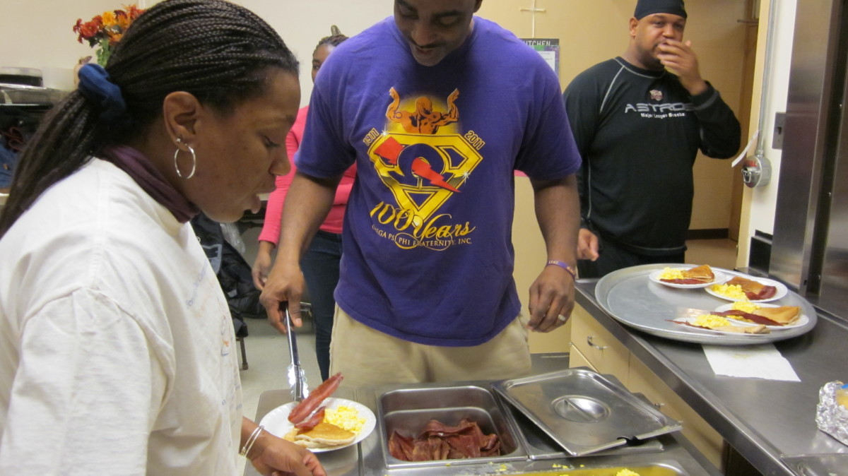 Breakfast programs: Volunteers look forward to serving the plates of bacon, eggs and pancakes.