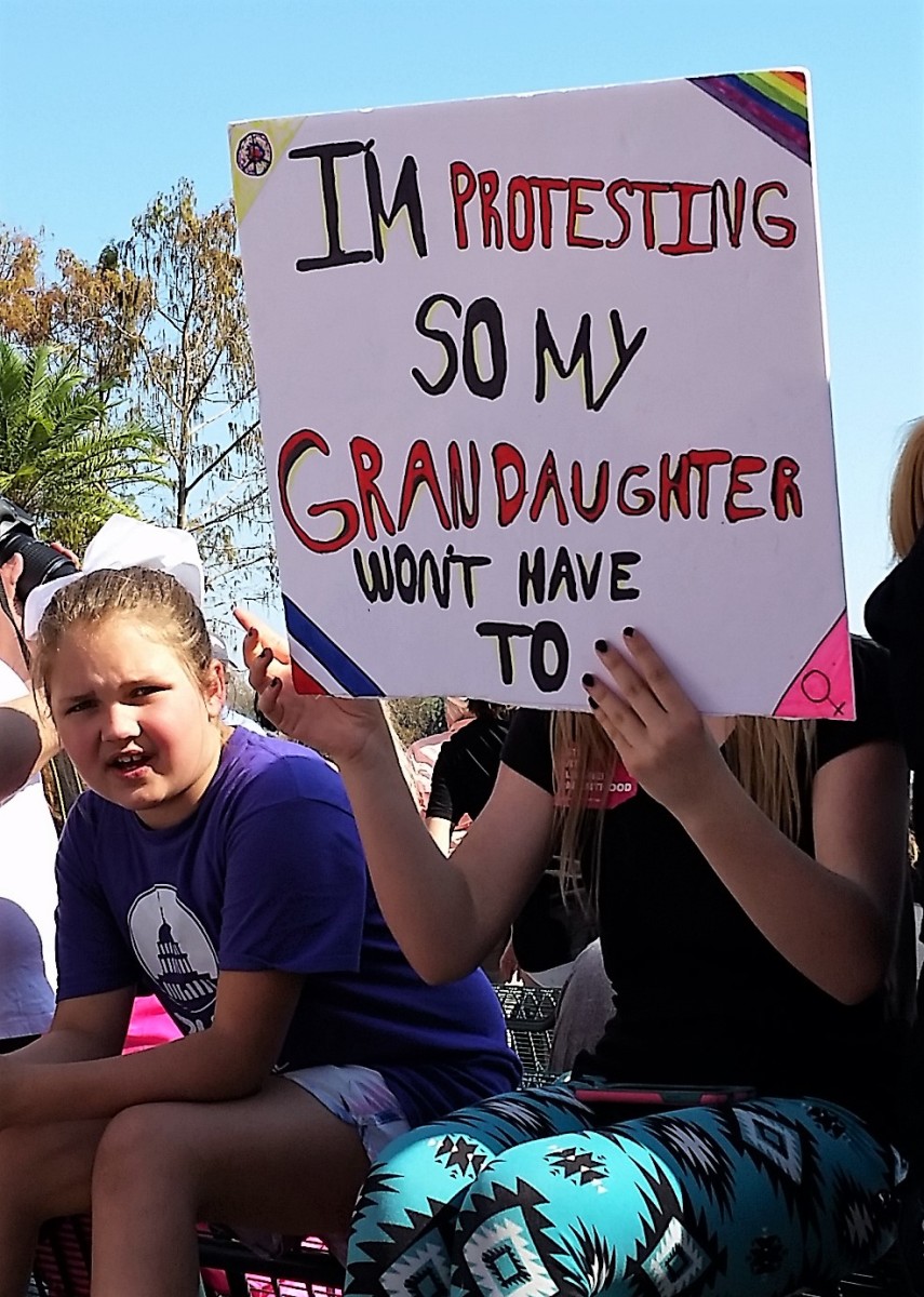 Sign: I'm protesting so my granddaughters won't have to