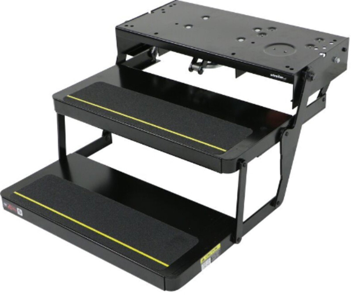RV steps: A standard two-step powered entrance step assembly.