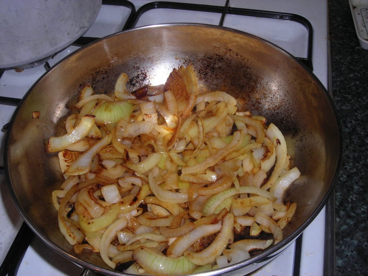 A very large onion, sliced, chopped into small pieces and cooked till brown. Cook for a minute more to crispen it up.