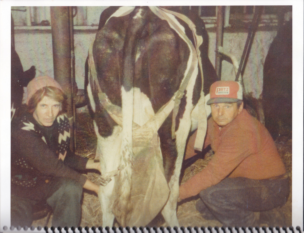 Mom and dad milking in the early 1980s.