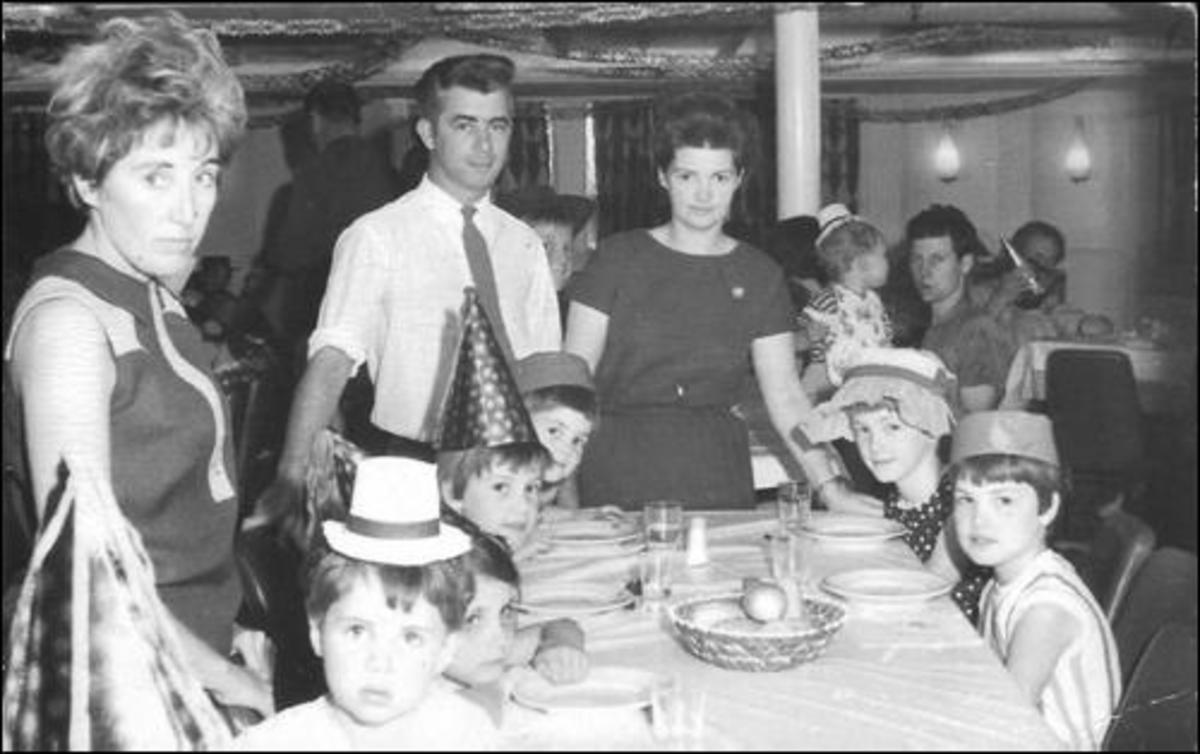 Emigrating to Australia in 1967 on board Castel Felice Ship.  Dinner time for the younger children..