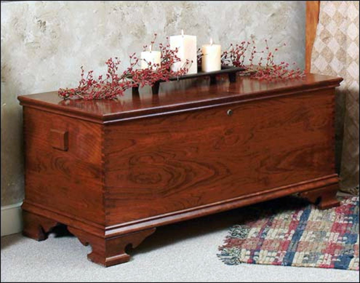 A Cherry-wood Chest Adorned with Candles and Autumn Bittersweet