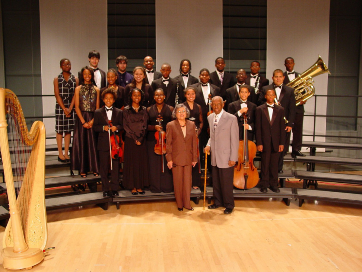 Angelica poses with members of the Atlanta Symphony Orchestra's Talent Development Program, along with the founders--Azira and (the late) Jesse Hill.