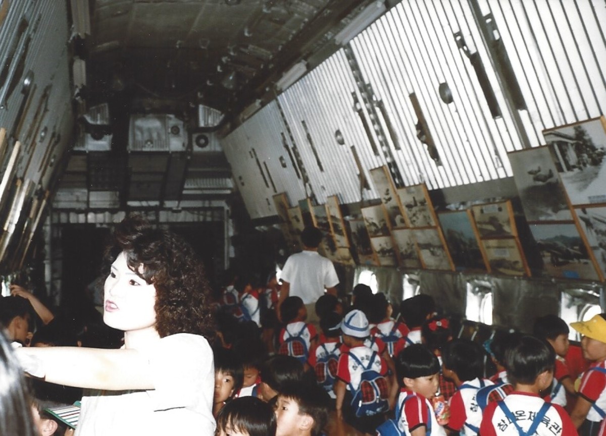 School children and their teacher inside the cargo bay of the C-124. School children and their teacher inside the cargo bay of the C-124.