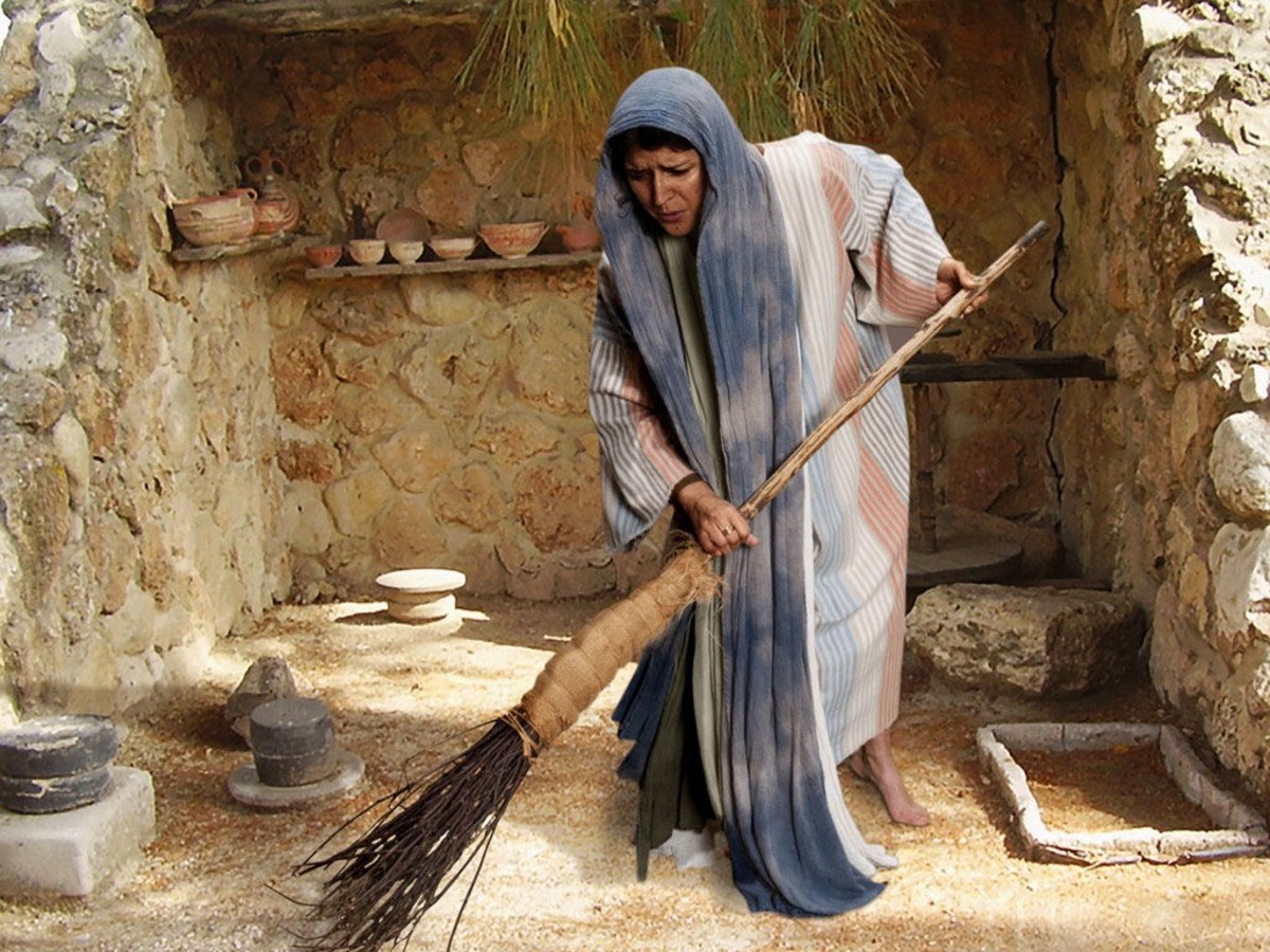 A woman sweeps her floor looking for the lost coin.
