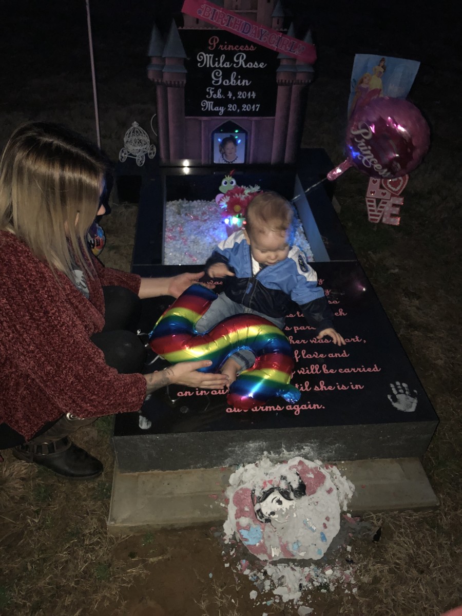 Our daughter’s 5th birthday celebration. This is me and her little brother-our rainbow baby-at her resting place. 