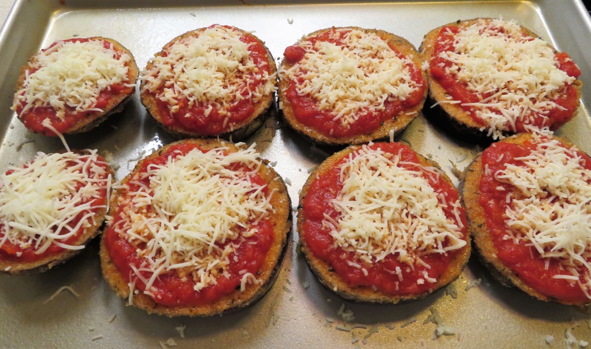 Next spread the mozzarella cheese on top of the eggplant slices.