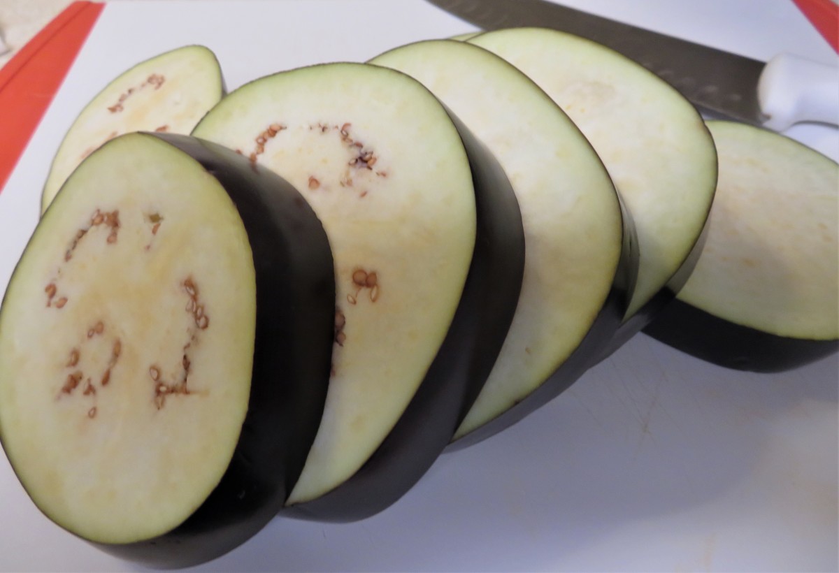 Slice the eggplant into 3/4-inch rounds