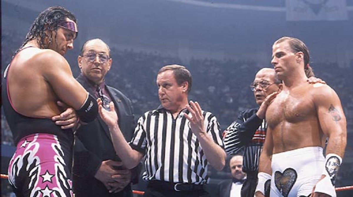 from L to R: Bret Hart, Gorilla Monsoon, Earl Hebner, Jose Lothario and Shawn Michaels at WrestleMania 12. Hart calls this "the toughest match of my career."