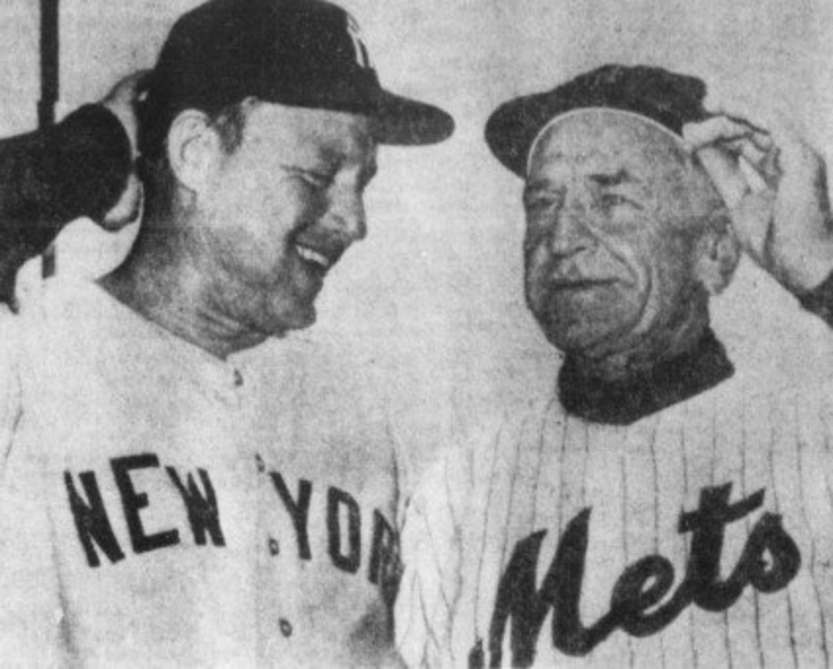 Casey Stengel (right), the Met's first manager, with Yankees manager Ralph Houk at an exhibition game in 1962