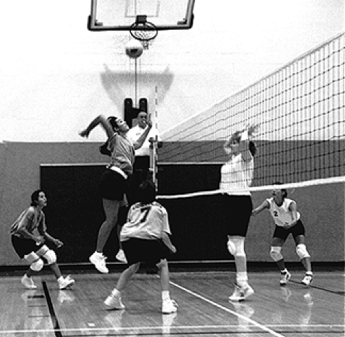 The baggy clothes of the 90s led many volleyball teams to switch to a baggier uniform like basketball players were wearing.