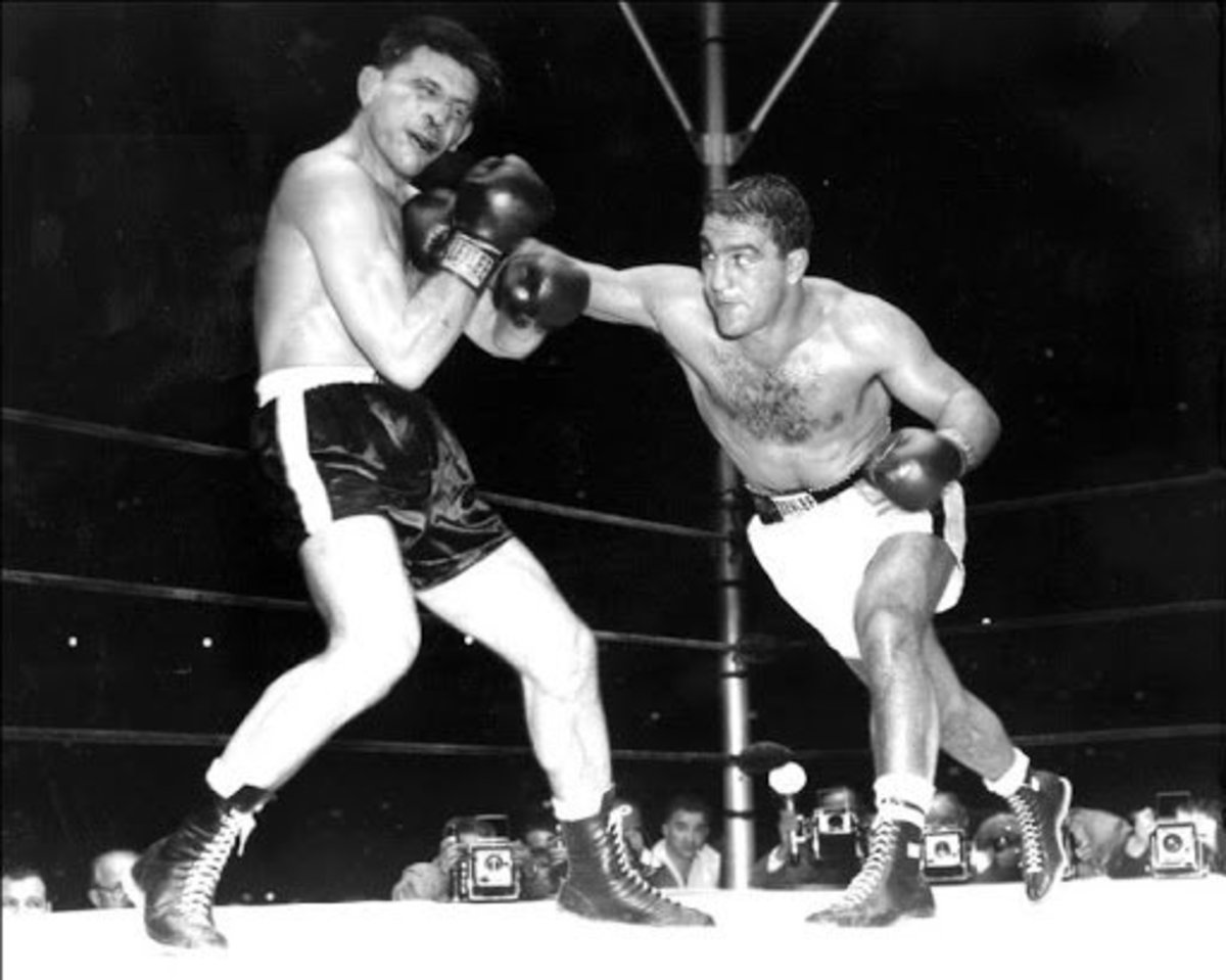 One of history's greatest boxers, Rocky Marciano, stood at almost 5'11" with only a 68" reach. 