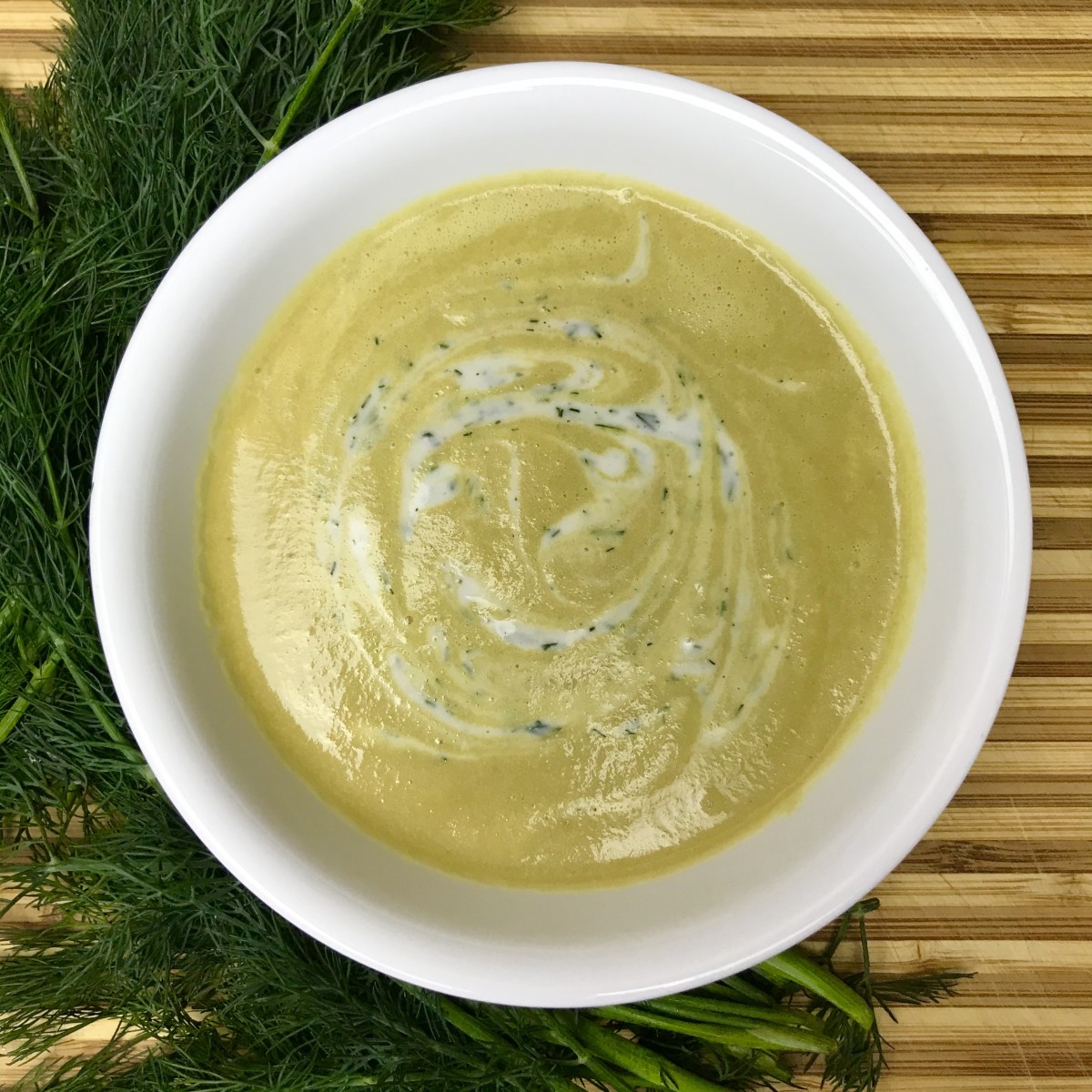 A vegan delight: creamy roasted golden beet soup with dill yogurt sauce