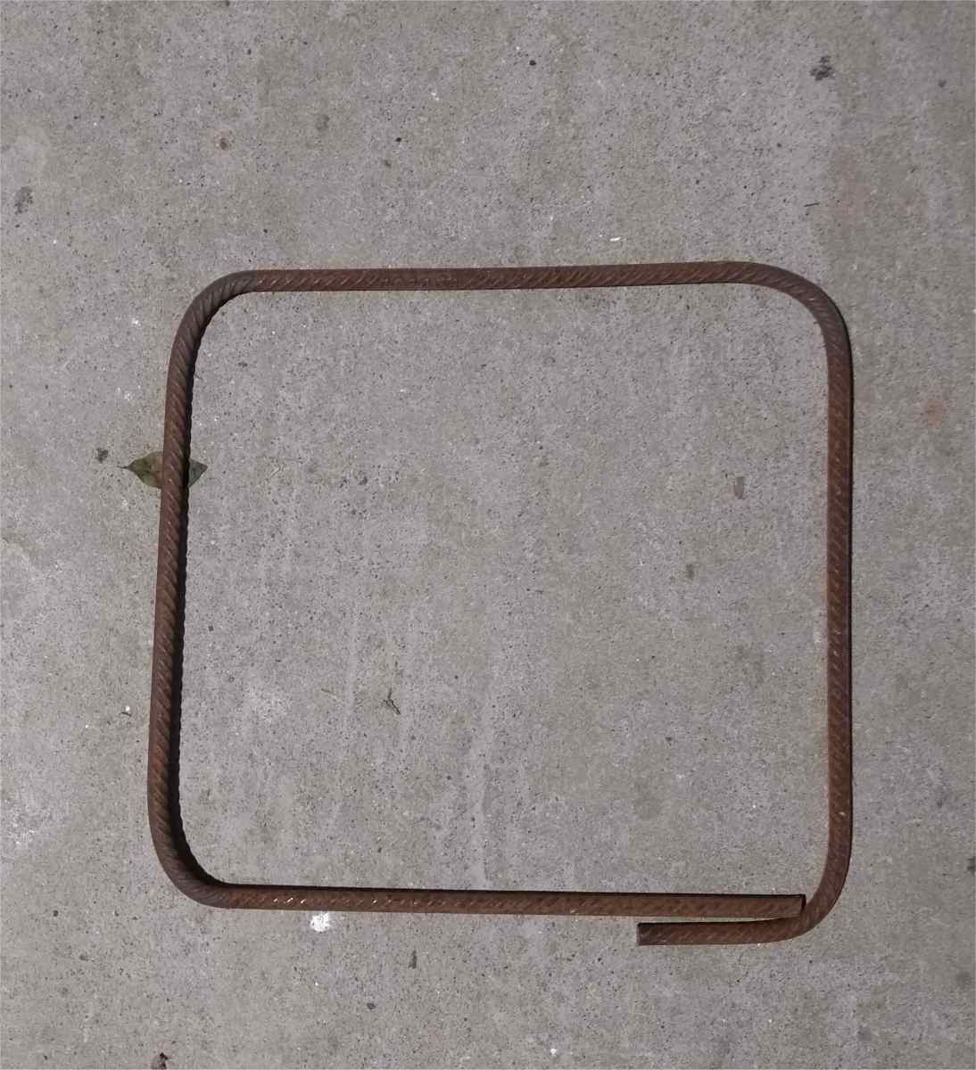 Square ring or "stirrup" made from rebar.