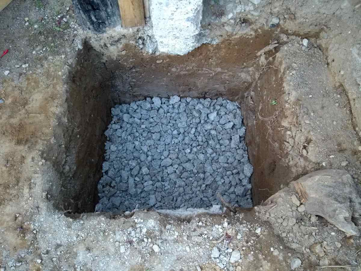 I broke up some of the concrete and used it as a sub-base.
