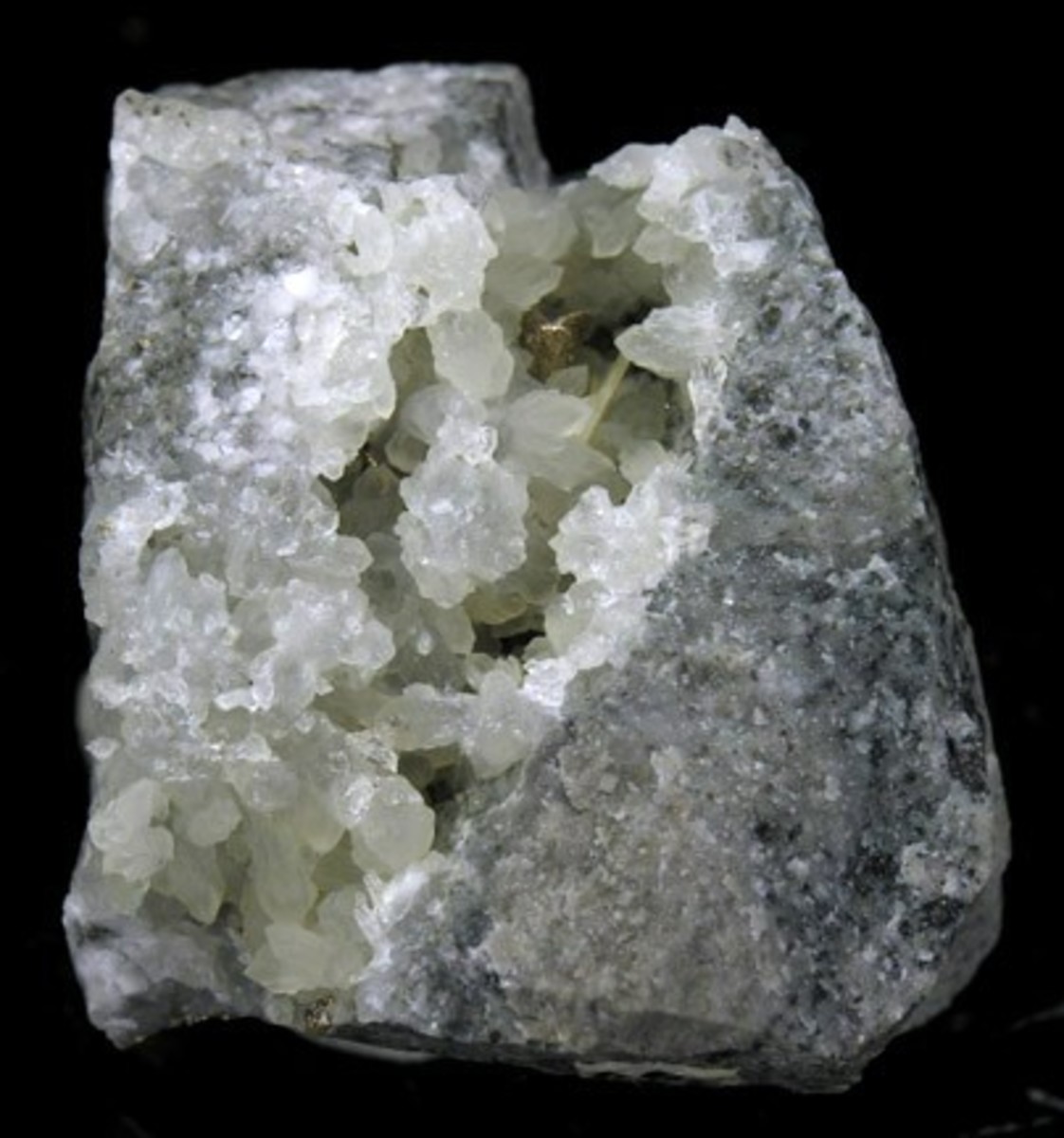This rare gold silver telluride forms in some of the finest crystals in the world in the Cripple Creek Mining District. Fine crystals of Krennerite on matrix are virtually impossible to obtain as the mines around Cripple Creek have long been played.