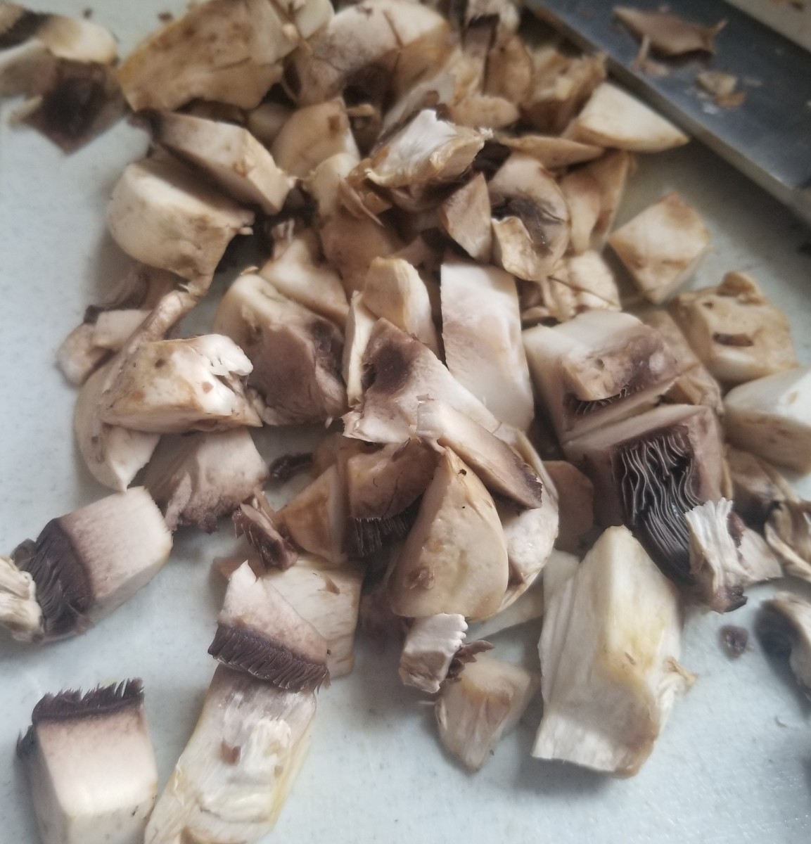 Chop the sliced mushrooms before adding them to the broth.