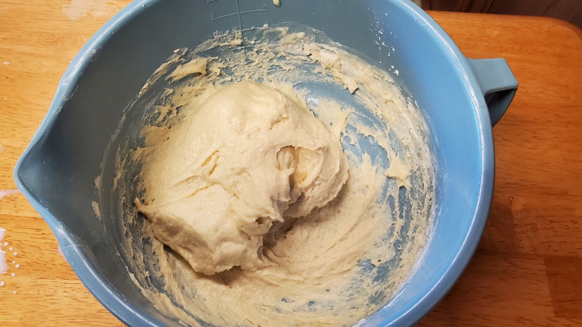 Add milk and mix to form a dough.