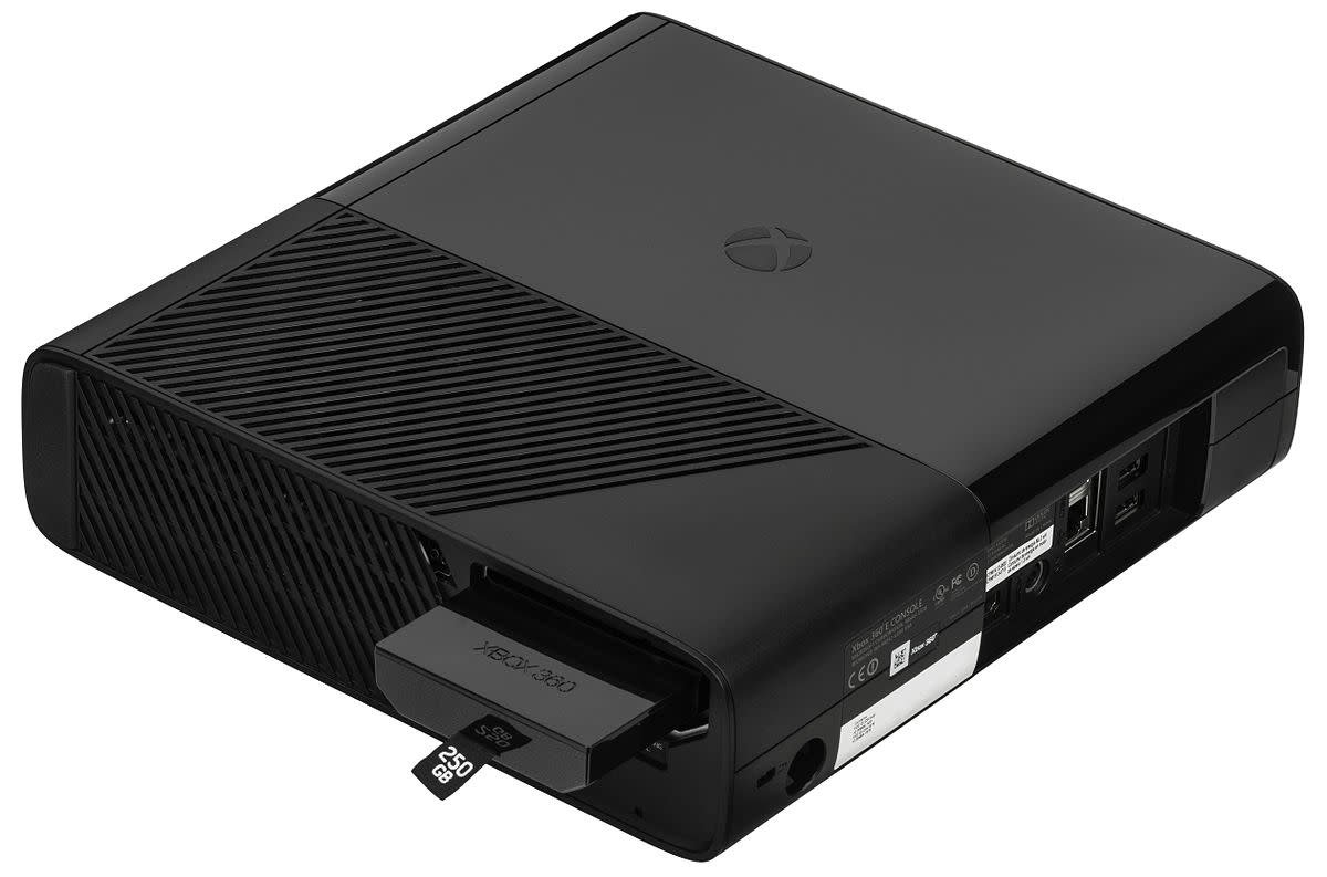 Xbox 360 E with HDD inserted inside standard enclosure.