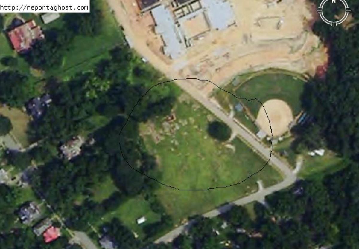 You can see here where I circled where you can currently see the part of the graveyard that is still there but the graveyard was at one time huge and was also across the road where you can see where the new Boundary Street Elementary School has been