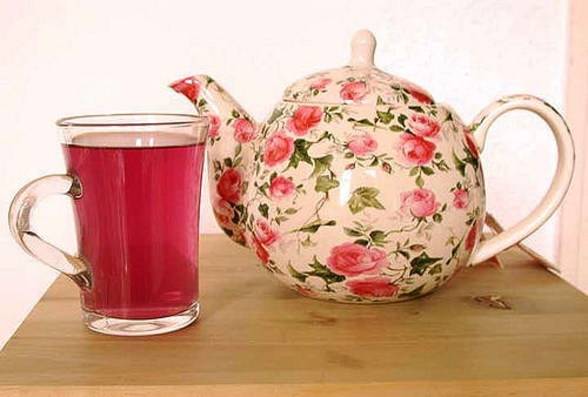 A modern rose-patterned teapot is just perfect when serving rose petal tea.