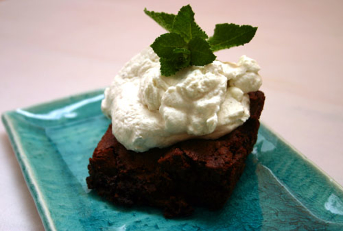 dark chocolate brownies topped with mint-infused whipped cream