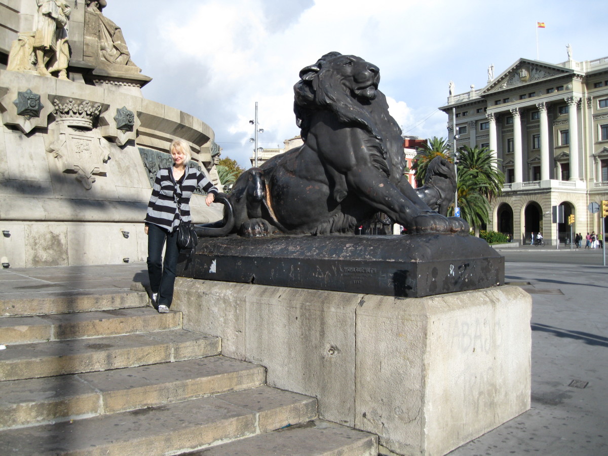 One of the eight lions at the base of the Columbus Monument in Barcelona, Spain.