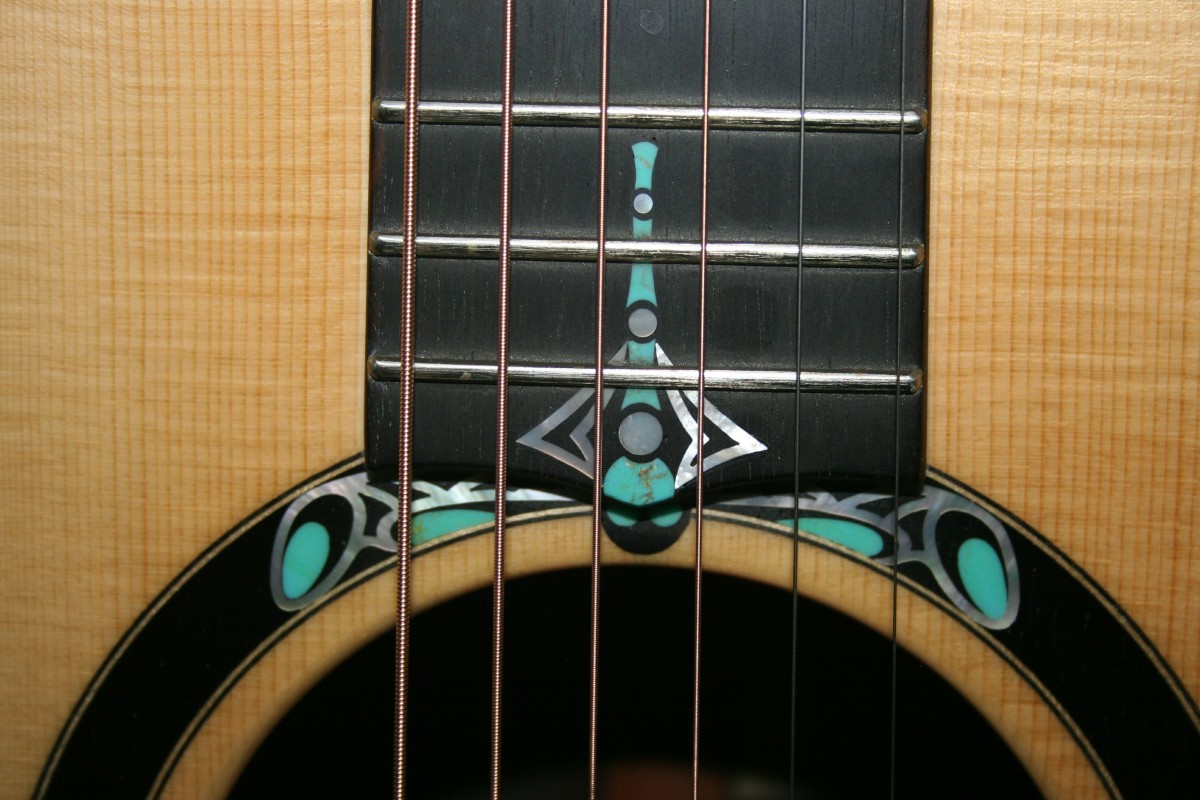 Inlay work on a custom acoustic guitar