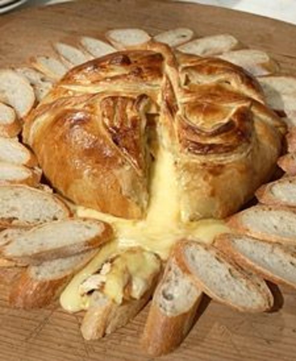 Martha Stewart's Baked Brie. Look at it oozing out into the crostini!