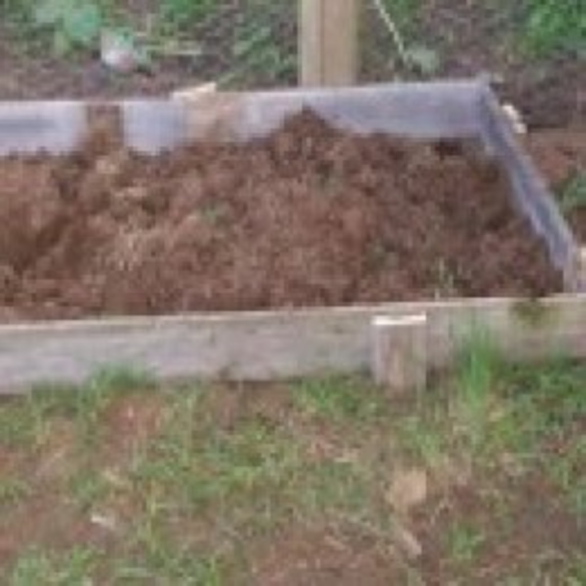 Make a Raised Garden Bed Using Old Wood Fence Boards