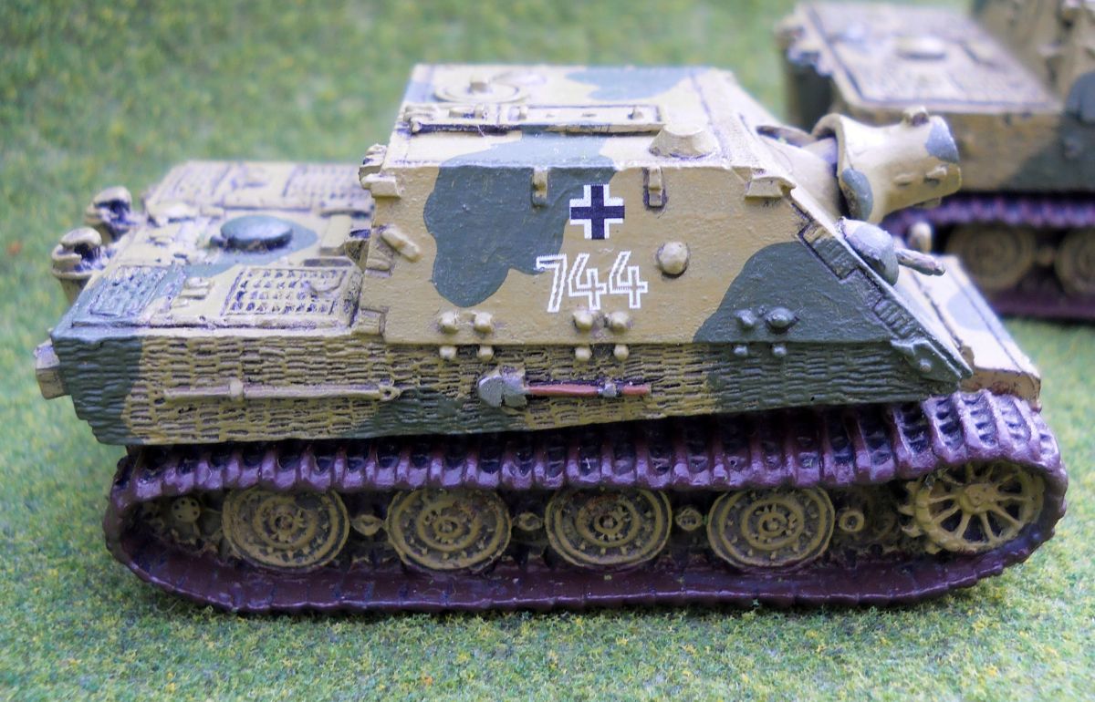 This Sturmtiger has decals, rusty tracks, and painted shovel.