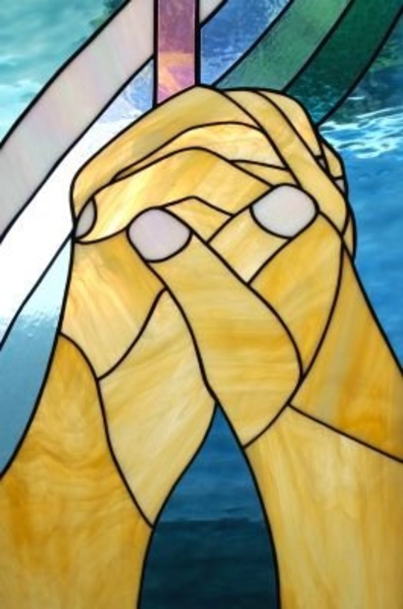 Beautiful stained glass art of praying hands is always special and meaningful.