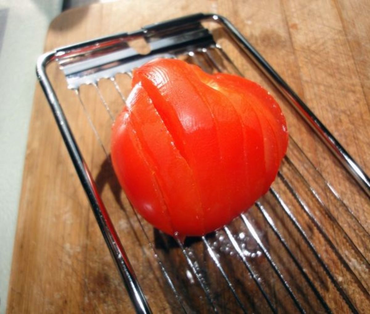 The tomato slicer I currently use for thinly slicing tomatoes.