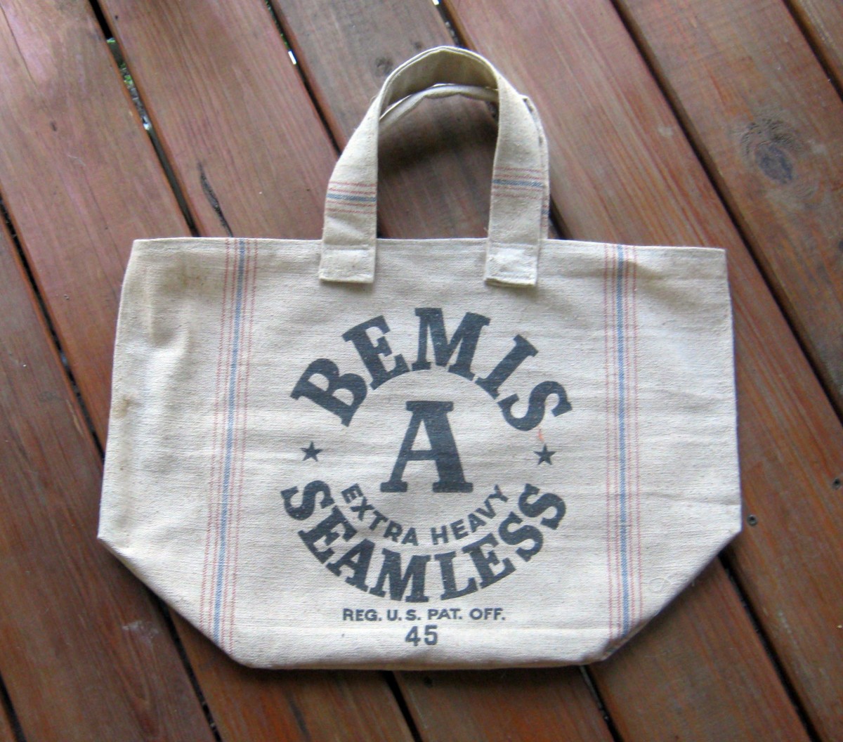 This bag is made from an old grain sack, making it strong and good for heavy items.